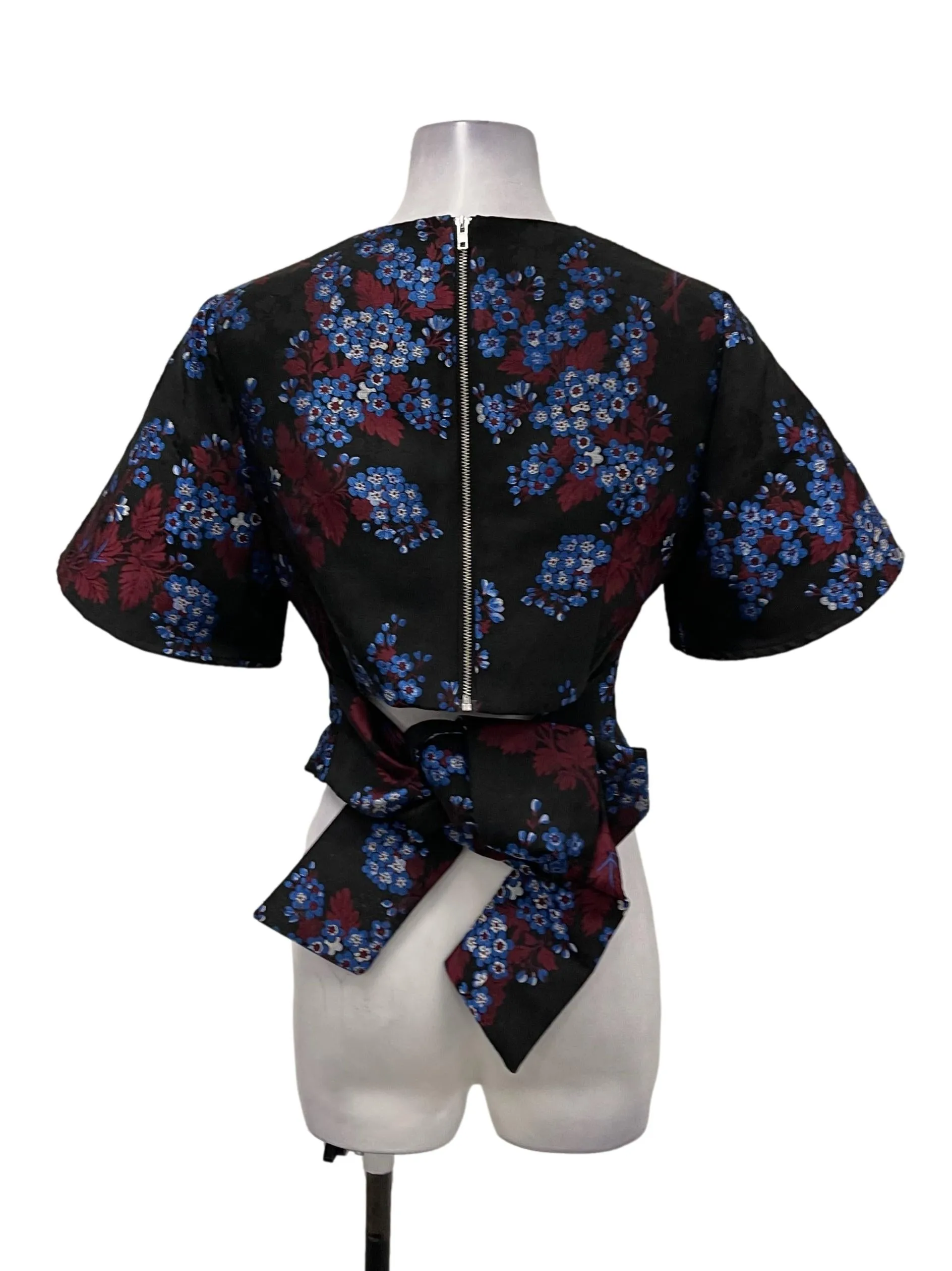 Black Roundneck Tie Back Blue And Red Floral Blouse