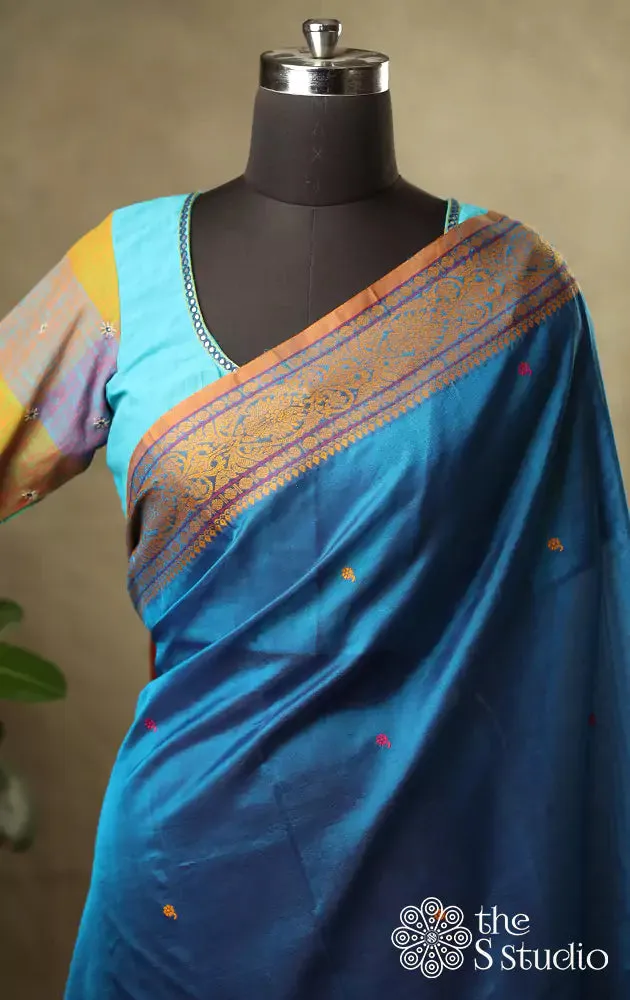 Blue cotton blouse with checked sleeves
