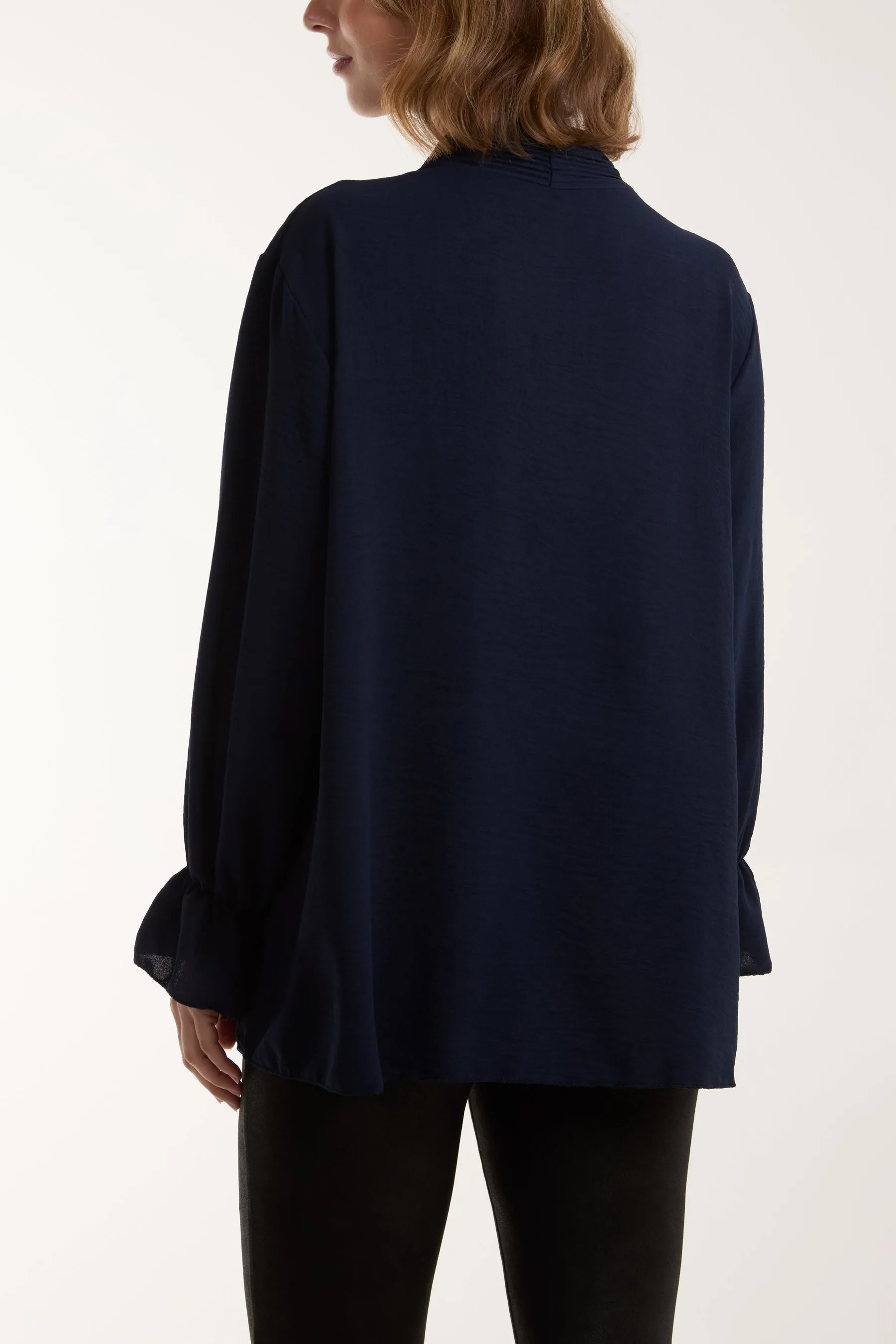 Pleated Tie Neck Bell Sleeve Blouse