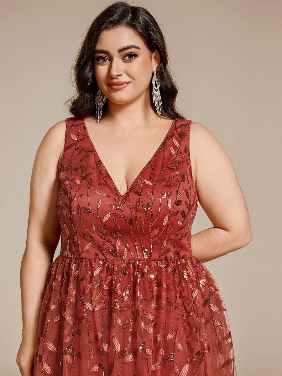 Robe d'invitée de mariage mi-longue à paillettes et feuilles grande taille