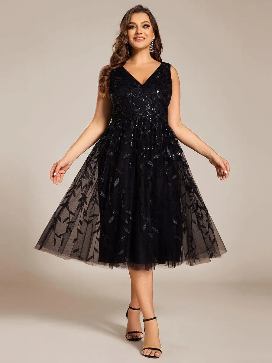 Robe d'invitée de mariage mi-longue à paillettes et feuilles grande taille