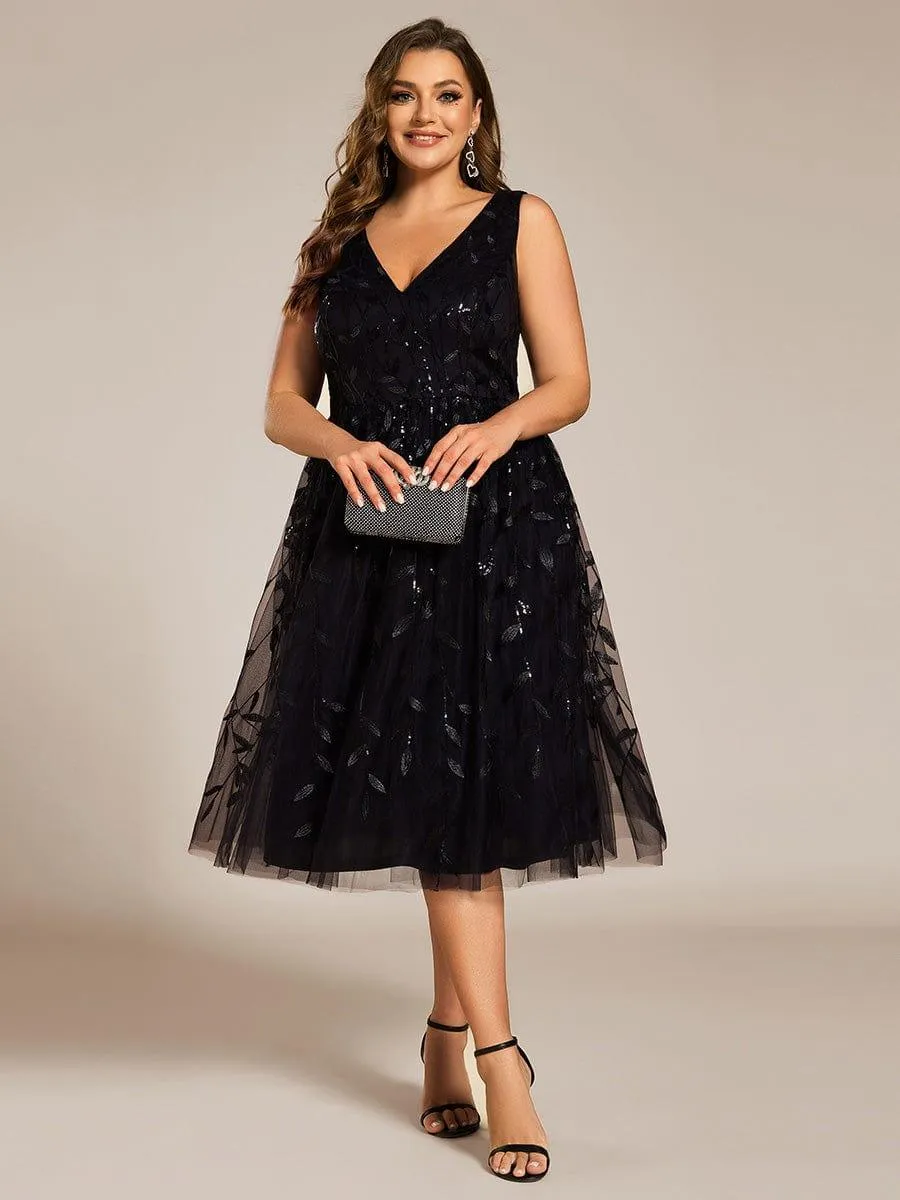 Robe d'invitée de mariage mi-longue à paillettes et feuilles grande taille