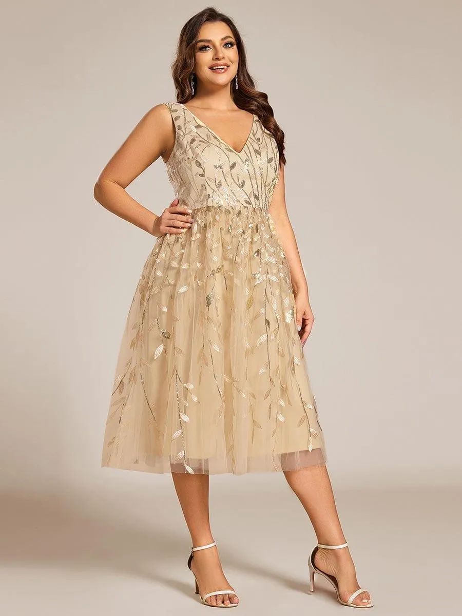Robe d'invitée de mariage mi-longue à paillettes et feuilles grande taille